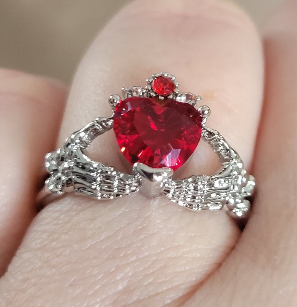 Size 7 gothic claddagh ring, skeleton hands holding red crystal heart